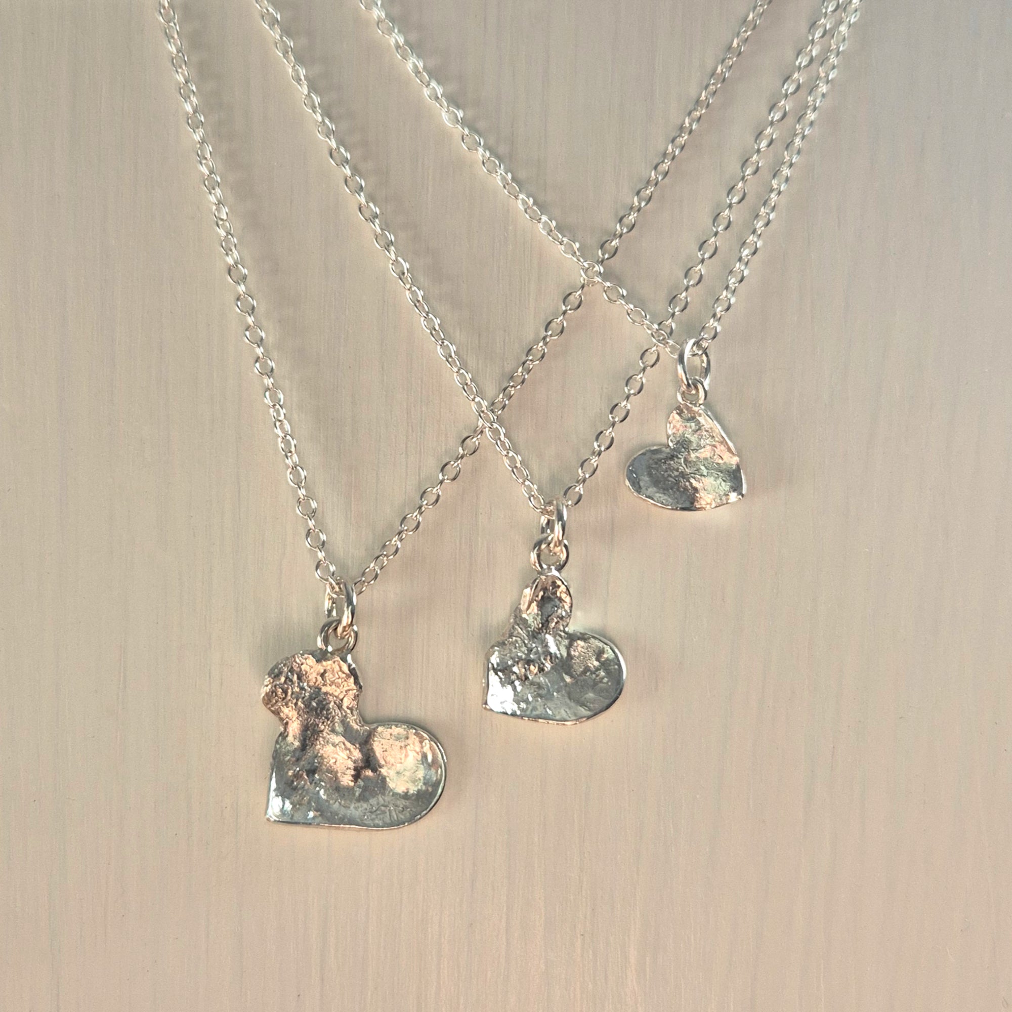 Melted Silver Heart Pendants