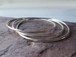 Load image into Gallery viewer, Triple Interlinking Silver Bangles
